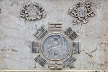 Chinese Eight Trigrams in the gray rock