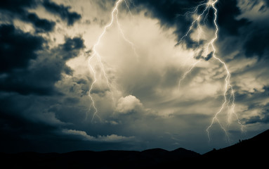 lightning on dark stormy sky - summer storm - bad weather forecast - warning