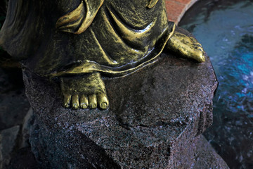 Fototapeta na wymiar Bronze sculpture toes