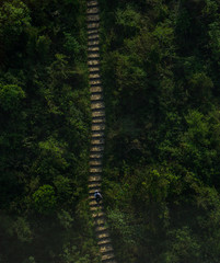 A man hiking up the way to the big Buddha in Lantau island in Hong Kong.