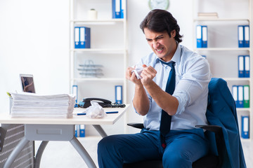 Businessman rejecting new ideas with lots of papers