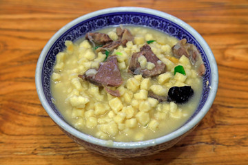 Shaanxi Special Snacks in China: Pita Bread Soaked in Lamb Soup