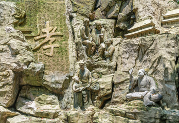 Cliff stone carvings on the half-mountain side of Emei Mountain, Sichuan Province, China