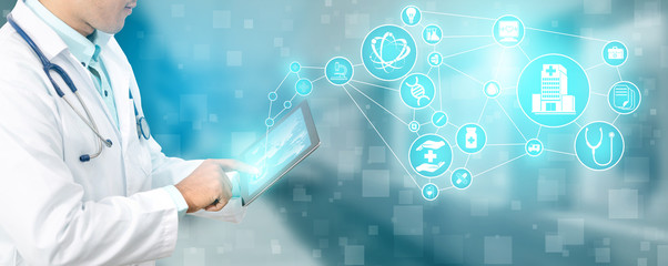 Medical Healthcare Concept - Doctor in hospital with digital medical icons graphic banner showing symbol of medicine, medical care people, emergency service network, doctor data of patient health.