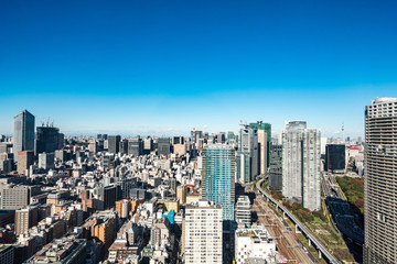 Asia business concept for real estate and corporate construction - panoramic urban city skyline aerial view under blue sky in hamamatsucho, tokyo, Japan