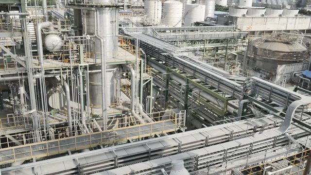 Engineering complex in Oil and Chemical refinery industrial plant , Structure and industrial equipment in production area of refinery plant , Panning video