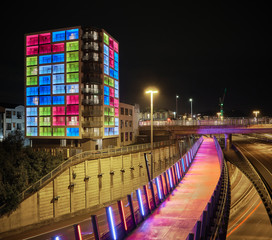 Auckland colorful light path from night traffic in the city from Northwestern Motorway