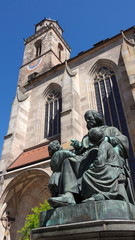 Fototapeta premium Medieval church and statue in Bavaria