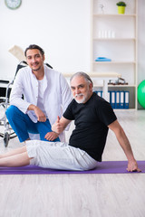 Fototapeta premium Aged patient recovering from injury in hospital