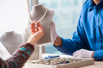 Young jeweler working in his workshop