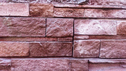 Closeup..Granite fence surface brown color.