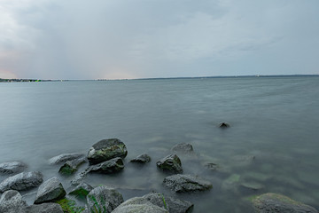 Lake view, stones, and trees at Claredon Beach Park Keswick Ontario Canada