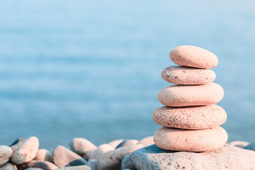 Balanced stones on a pebble beach
