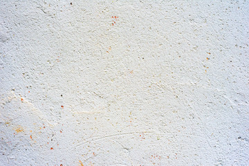 Texture of a concrete wall with cracks and scratches which can be used as a background