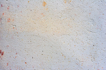 Texture of a concrete wall with cracks and scratches which can be used as a background