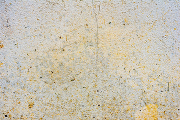 Texture of a concrete wall with cracks and scratches which can be used as a background