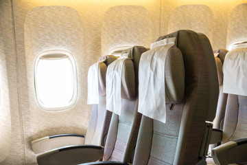 Seats in aircraft cabin