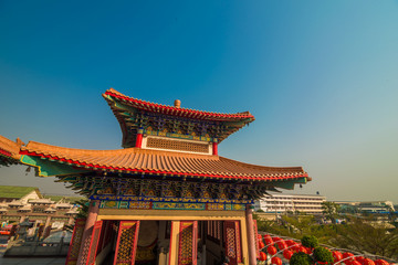 Fototapeta premium Red pgoda of chinese style temple in Bangkok