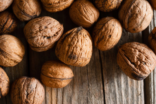 Walnuts On Old Wooden Table Directly Above