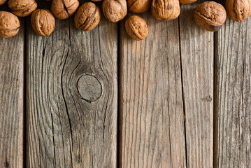 walnuts on old wooden table directly above