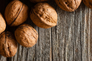 walnuts on old wooden table directly above