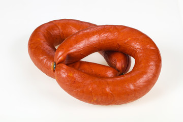 Tasty meat sausages over white background