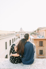 Wedding photography in Italy. Couple walking the streets of Rome, sightseeing and panoramic views.