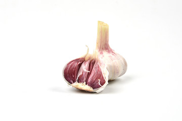 Heads and cloves of garlic isolated on white background