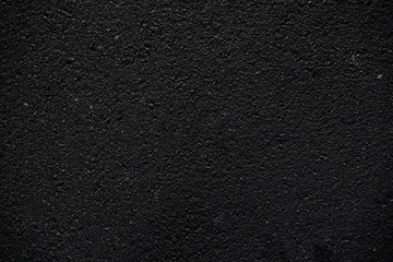 Dark asphalt texture background graphic asset.