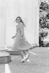  Nice European or American plump girl at city, concept of modern women lifestyle, walk in park 