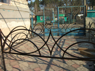 metal fence in the cemetery outdoor day
