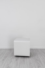Light interior, background, white cube table in white empty room