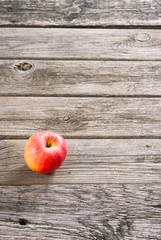 apple on old wood table