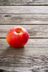 apple on old wood table