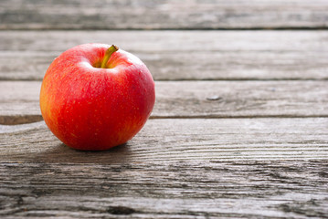 apple on old wood table