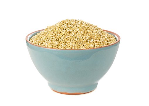 A Blue Bowl Of Quinoa Isolated On A White Background