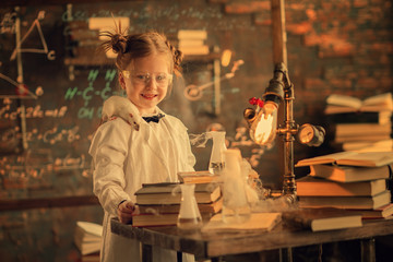 portrait of smiling girl with rat on the shoulder working in lab