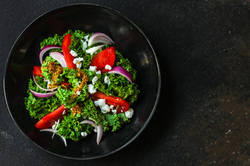 Healthy salad, tomato, leaves mix salad (mix micro greens, juicy snack). food background