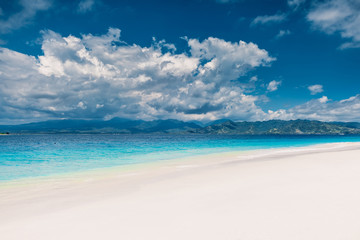 Paradise beach with blue ocean in tropical island