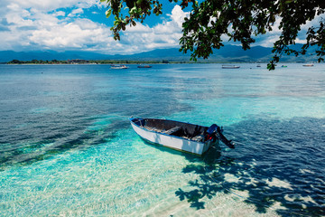 Tropical ocean with boat in paradise island