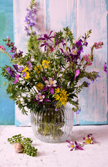 Vase with wildflowers in a glass vase