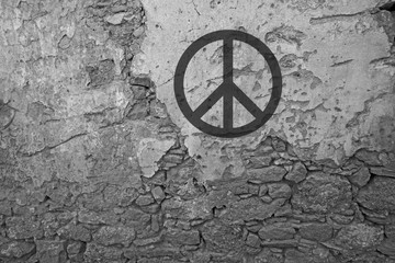 Peace symbol on an old wall 