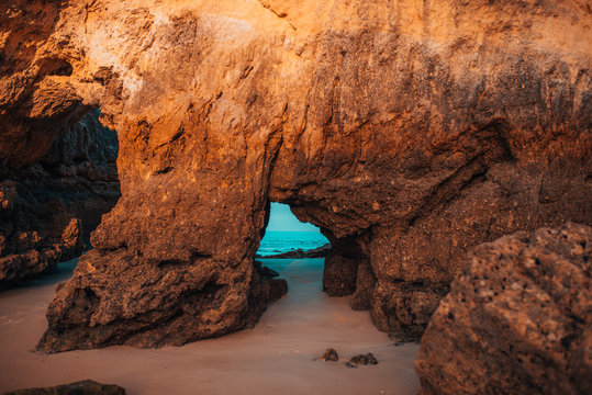 Cave on the beach, cavity in the Algarve of Portugal