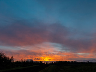 beautiful sunset sky, dramatic clouds, selective focus close up