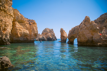 The Ponta da Piedade is a bleak and windswept headland, and the beauty of the region is only discovered on descending the cliffs, where the exposed cliffs reveal their golden colour, and the turquoise