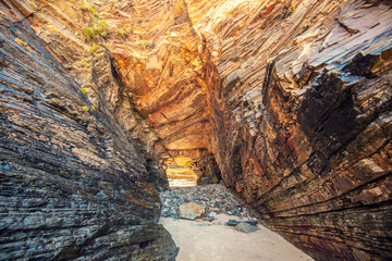 Rocky seashore. Natural landscape. Rocky grotto at low tide