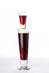 Strong alcohol cocktail jager bomb two glasses liquor and beer isolated on white background