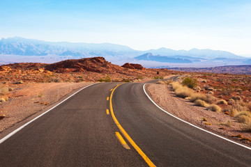 Winding road  through the desert landscape. White Domes Road (Mouse’s Tank Road), Nevada, United States.