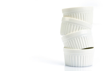 Fototapeta na wymiar the stacking of small white bakery cup on white background
