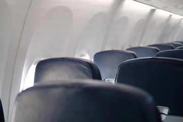 Fototapeta premium empty passenger seat inside airplane. chair in aircraft
